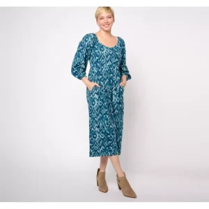 Dresses<AnyBody Petite Daydreamer Knit Printed Dress with Smocking - a world of fashionable women's clothing, including a wide selection of dresses and trendy accessories.