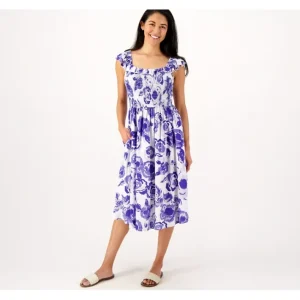 Dresses<Destination 365 Printed Ruffle Tank Dress with Smocking - a world of fashionable women's clothing, including a wide selection of dresses and trendy accessories.