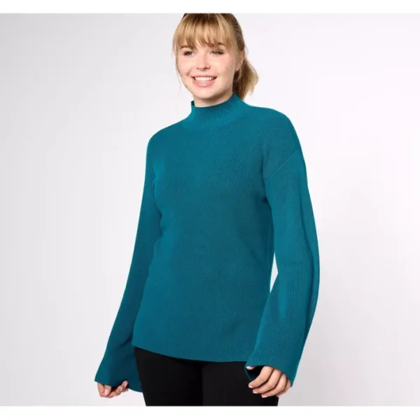 Shop All<Girl With Curves Turtleneck Swing Sweater with Side Slit - a world of fashionable women's clothing, including a wide selection of dresses and trendy accessories.